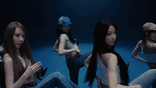a girl wearing a blue hat that says ' ford ' on it