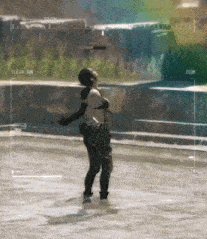 a woman in a bikini is standing in a pool with the word elevation on the bottom right