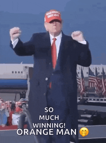 a man in a suit and tie is dancing with the words so much winning orange man below him