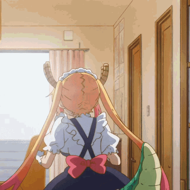 a cartoon character with horns and a bow in her back