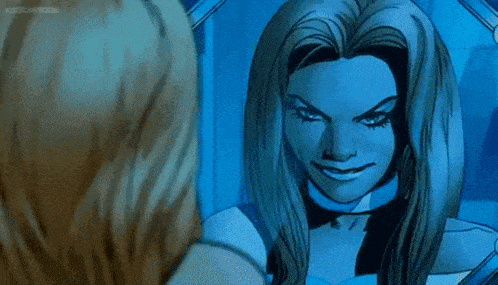 a woman is looking at herself in a mirror .