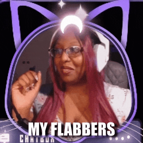 a woman with red hair and glasses says my flabbers in a purple frame