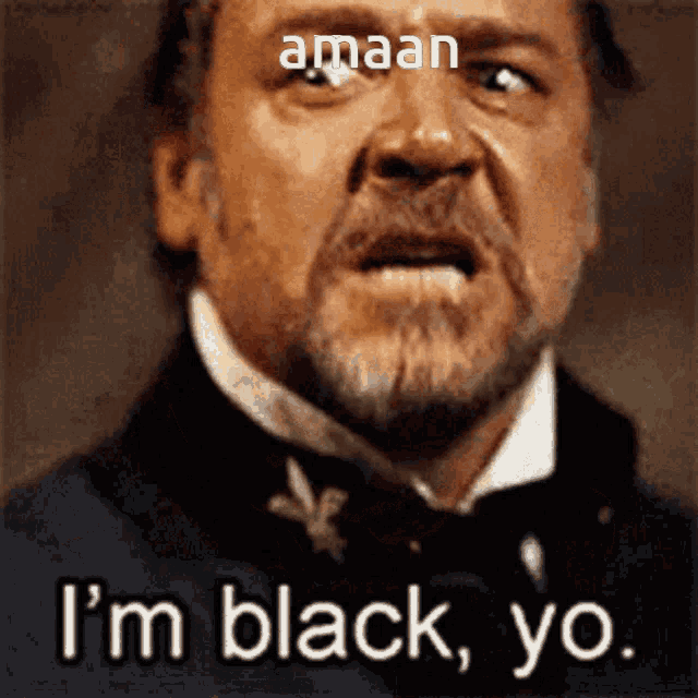 a man with a beard is saying i 'm black yo.