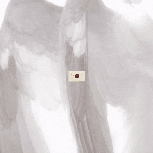 a woman dressed as an angel with a letter on her back