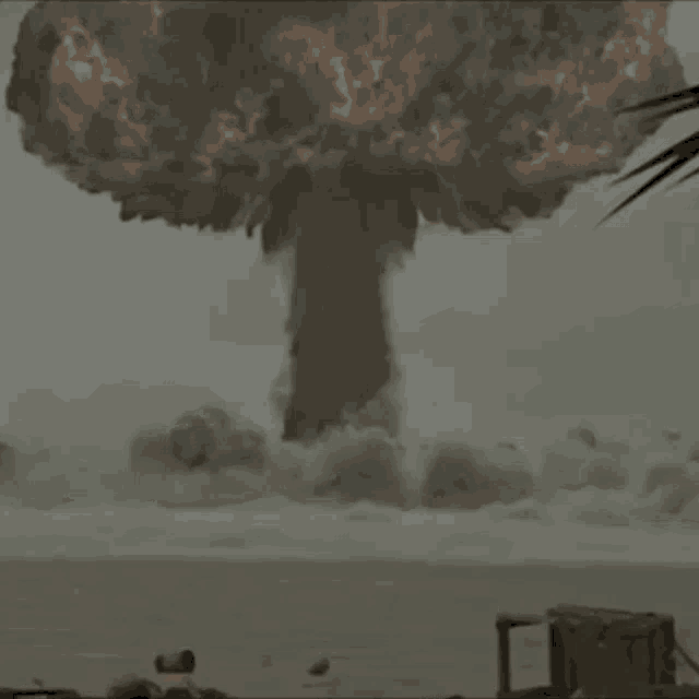 a mushroom cloud is coming out of the ground