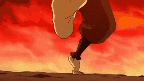 a person is running barefoot on a hill with a red background .