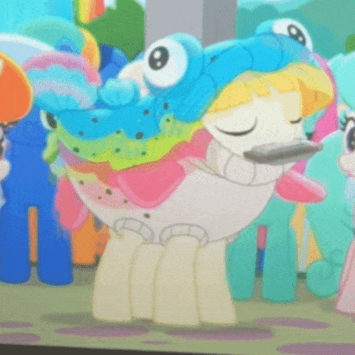 a cartoon of a pony wearing a colorful frog hat