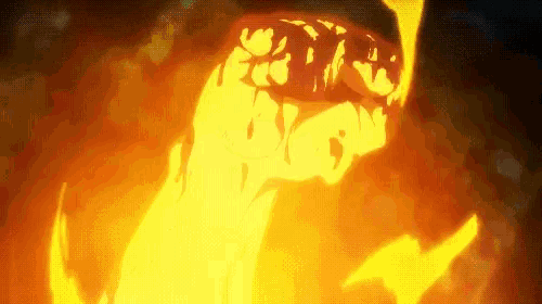 a close up of a fire coming out of a hole in the ground