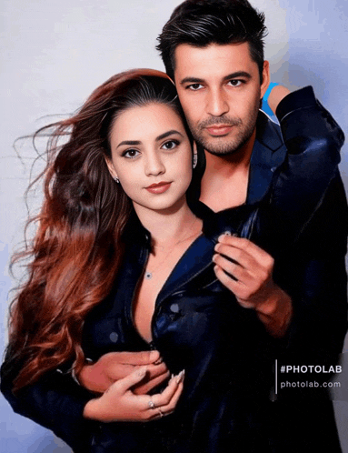 a man and a woman are posing for a photo with #photolab