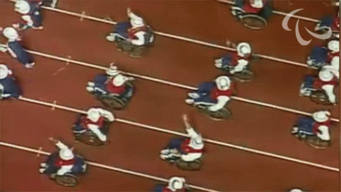 Parade Paralympic Games GIF - Parade Paralympic Games People In Wheelchairs GIFs