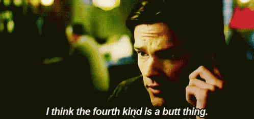 a man is talking on a cell phone and saying i think the fourth kind is a butt thing .