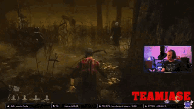 a man playing a video game with the words teamjase on the screen
