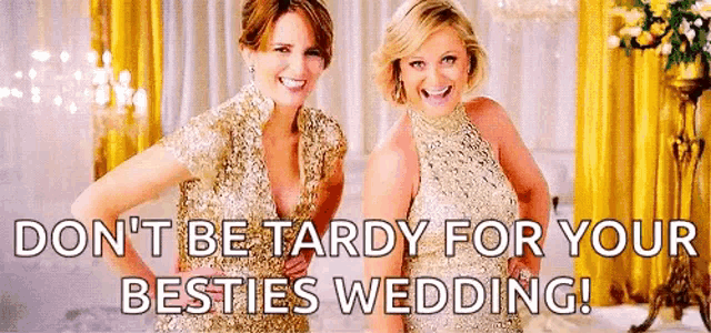 two women in gold dresses are standing next to each other in a room and smiling .