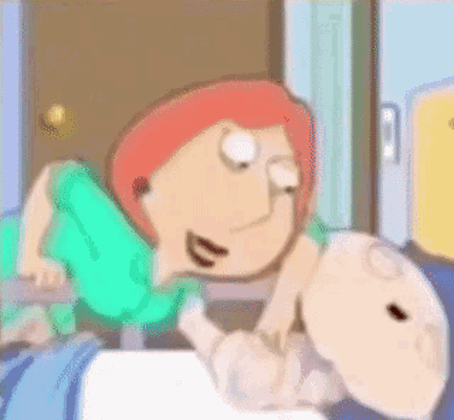 a cartoon character is laying on a bed next to a man .