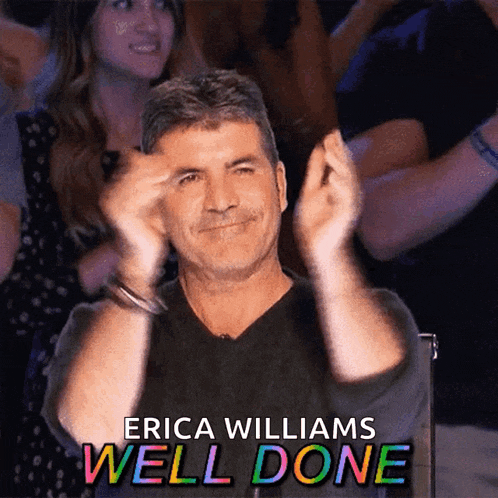 a man applauds with the words erica williams well done behind him