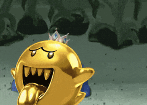 a gold cartoon character with a crown on top of it