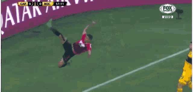 a soccer game being played on fox sports