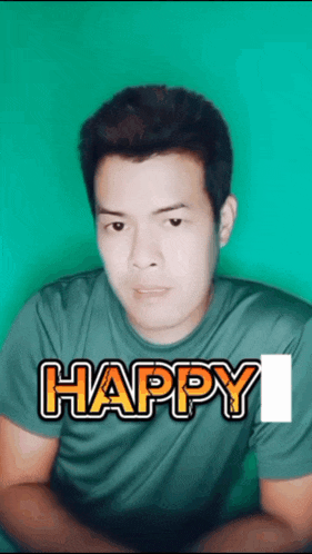 a man in a green shirt with the word happy on it