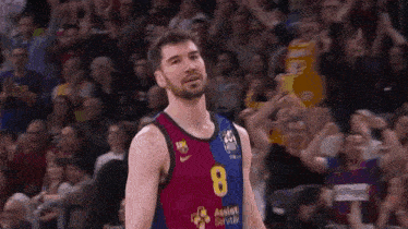 a basketball player with the number 8 on his shirt