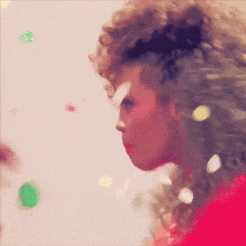 a painting of a woman with curly hair in a red top