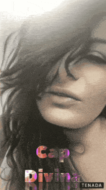 a close up of a woman 's face with the words cap divina behind her