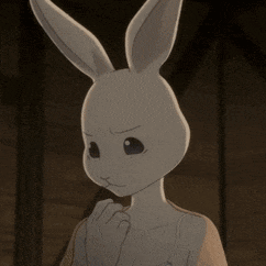 a cartoon rabbit with long ears is looking at the camera with a sad look on his face .