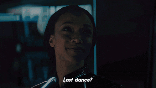 a close up of a woman 's face with the words last dance below her