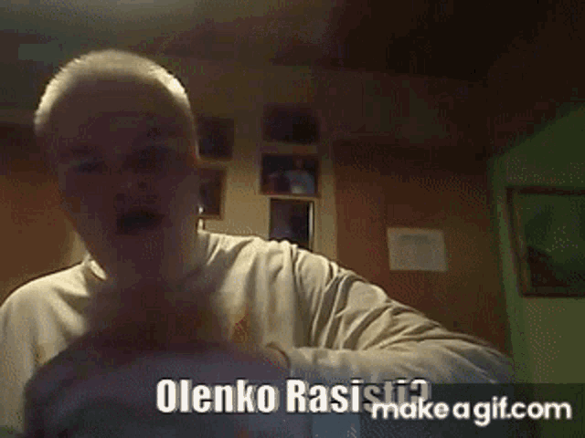 a man in a white shirt says olenko rasi on a gif.com