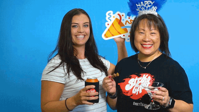 two women are posing for a picture and one has a shirt that says sweet team on it