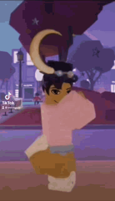 a cartoon character wearing a top hat and a crescent moon on his head is dancing in a video game .