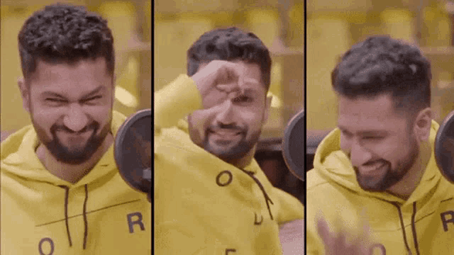 a man with a beard wearing a yellow hoodie with the letter r on it