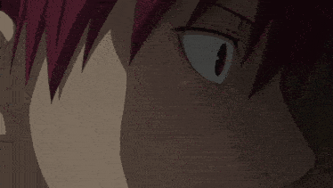 a close up of a person 's face with red hair and a white eye