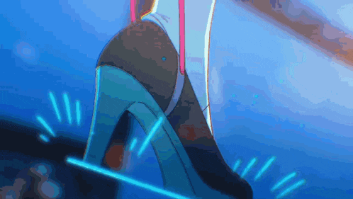 a person wearing a pair of high heels is standing on a blue surface