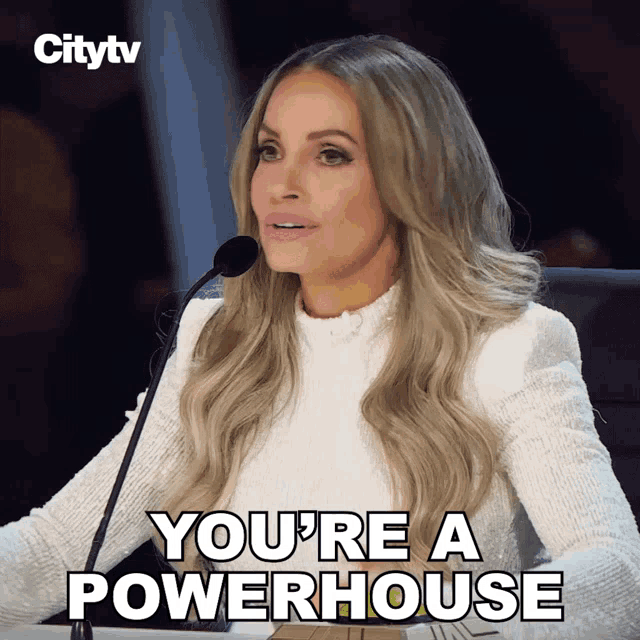 a woman speaking into a microphone with the words you 're a powerhouse
