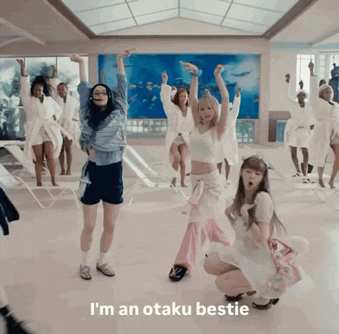 a group of women are dancing in a room with the words i 'm an otaku bestie written on the bottom