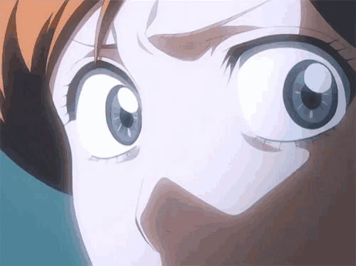 a close up of a person 's face with their eyes closed