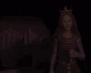 a woman wearing a crown and holding a cup