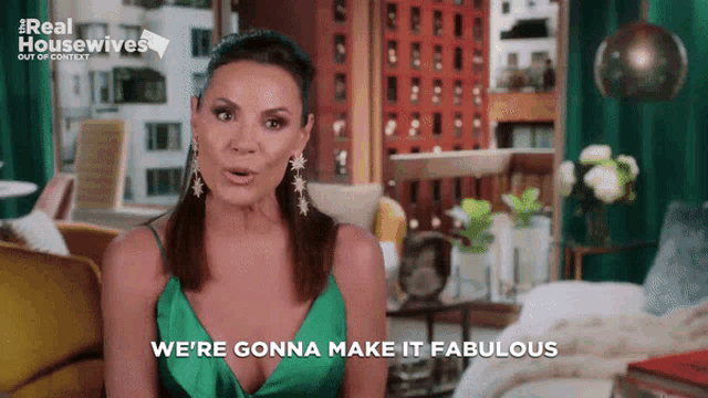 a woman in a green dress is talking about real housewives