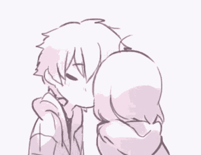 a boy and a girl are kissing each other on the cheek .