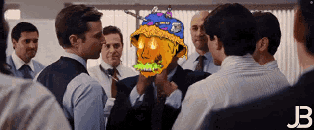 a group of men are gathered around a man with a skull on his face