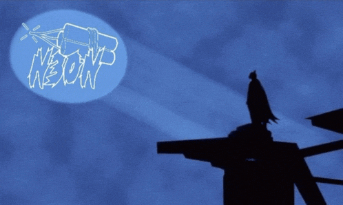 a silhouette of a bat on a roof with a neon sign above him