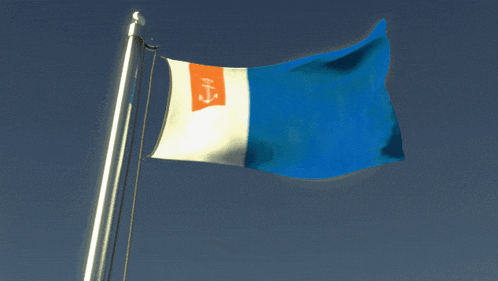 a blue white and orange flag with an anchor on it is flying in the wind