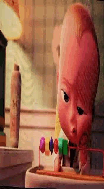 a baby is playing with a toy that has a bottle that says ' mrs ' on it