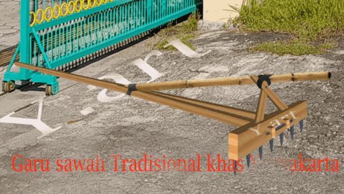a drawing of a wooden rake with the words garu sawah traditional khas jakarta