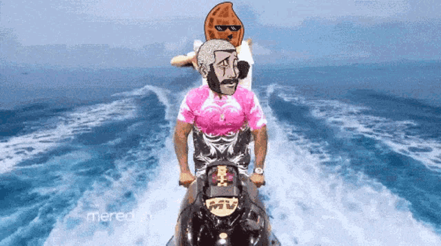 a man in a pink shirt is riding on the back of another man on a jet ski