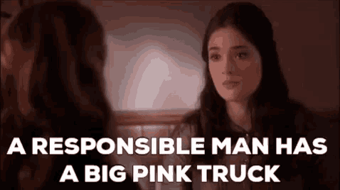 a responsible man has a big pink truck is being told by a woman .