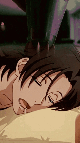 a close up of a person laying down with their mouth open