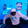 a blurry picture of a person wearing a pink hoodie and a hat .
