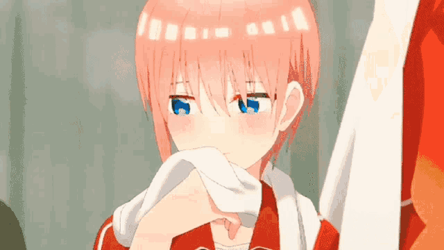 a girl with pink hair and blue eyes is holding a towel around her mouth .