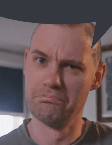 a man with a speech bubble over his head making a funny face